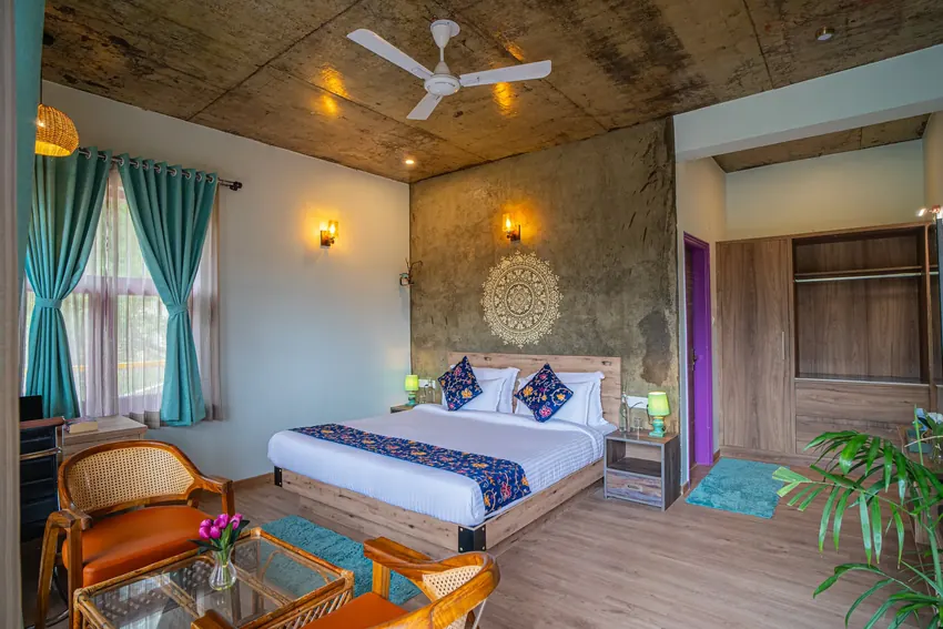 Studio suite with wooden textures and scenic valley views